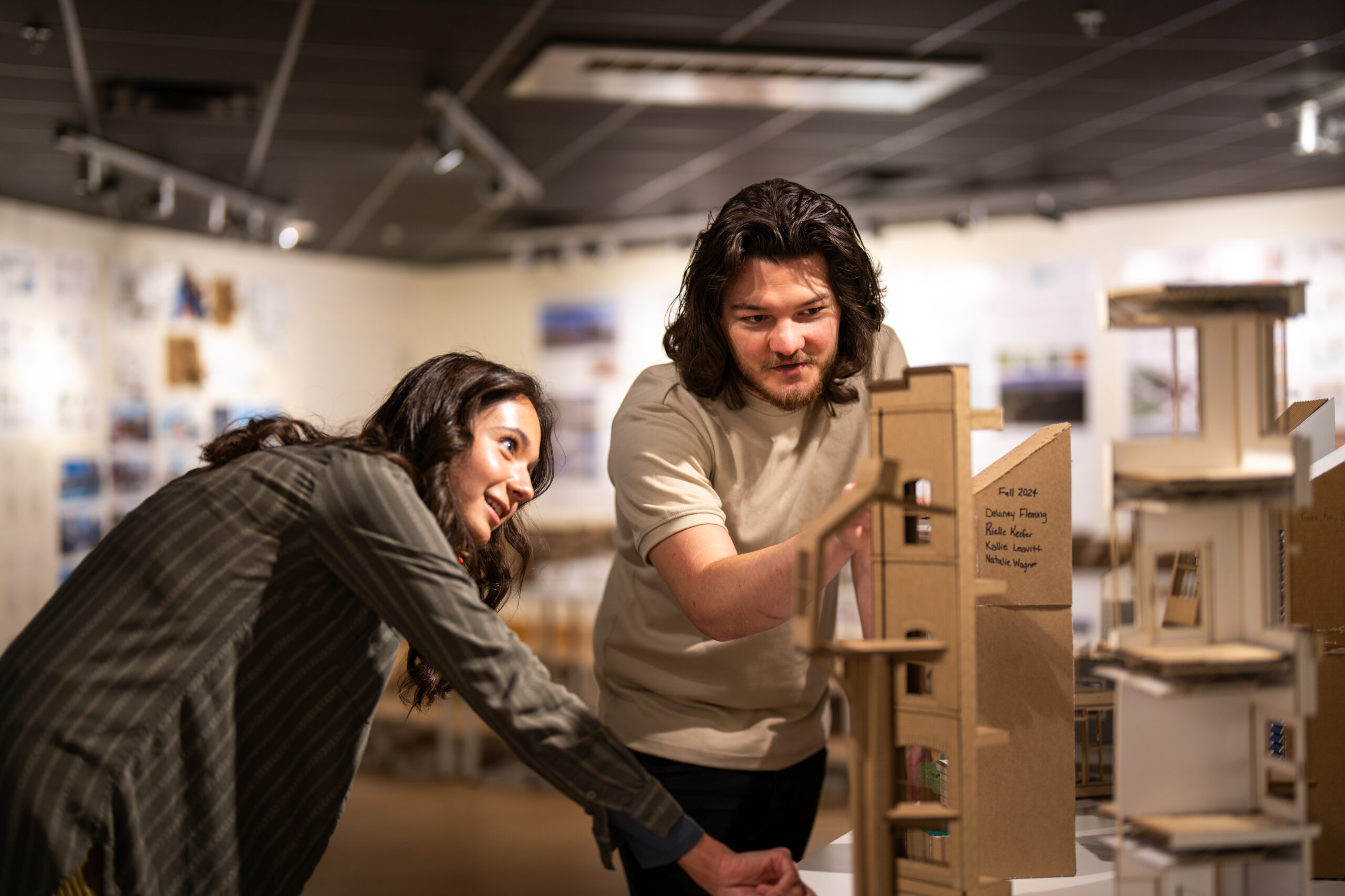 Architecture students working together in a studio